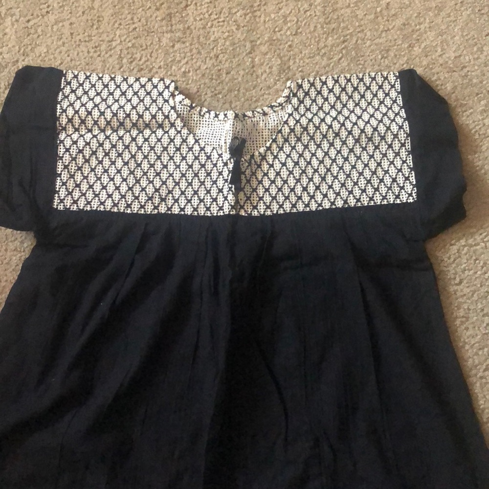 Black and white blouse.